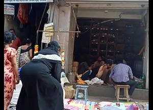Indian muslim aunty sitting irritant elbow market
